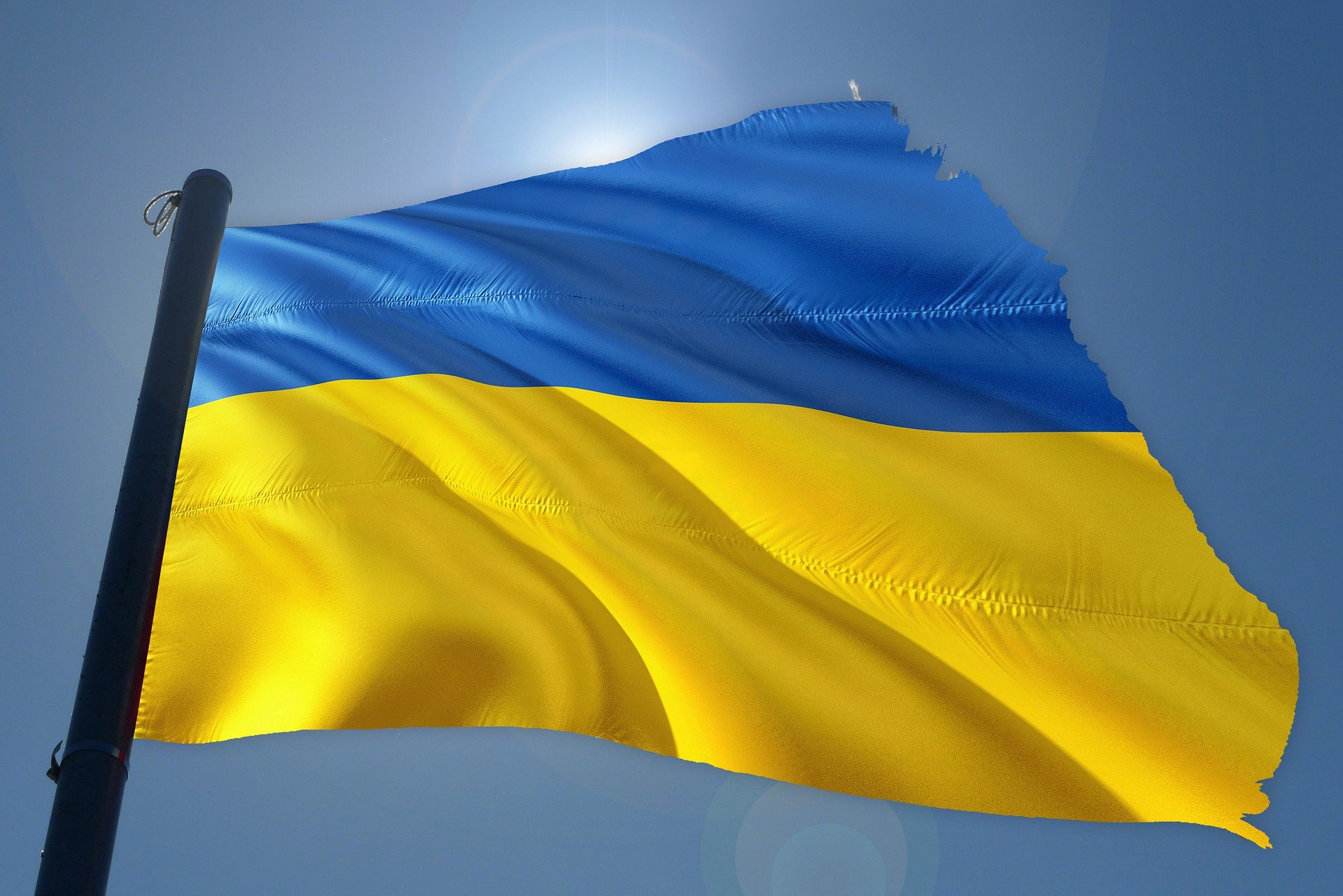 Ukraine flag fluttering on a flagpole